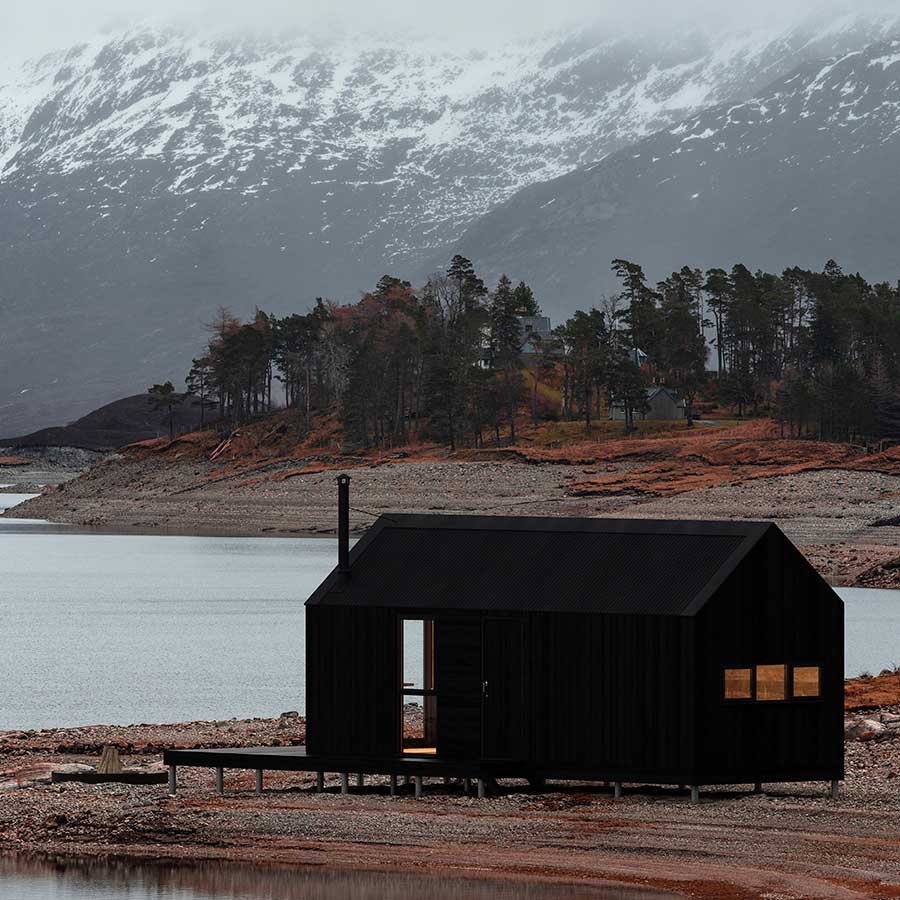 CGI of a small refuge lodge situated next to a lake in the Scottish Highlands