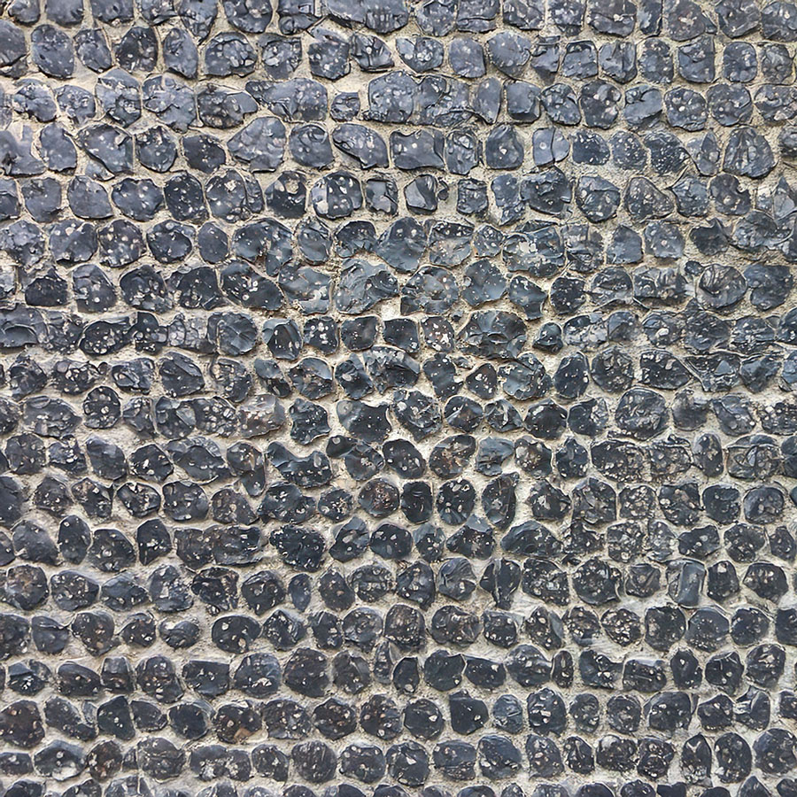 portion of flint stone wall used as a texture map with canvas expanded using generative expand in Photoshop
